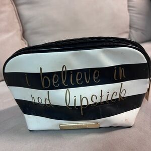 Chic Striped Cosmetic Bag with Gold Accents